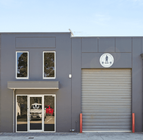 Exterior view of industrial property for sale in Airport West with secure roller door access