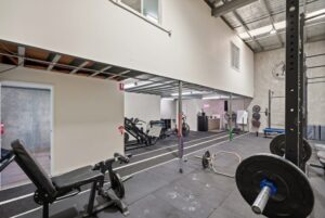 Ground floor warehouse with gym fit-out and storage potential in commercial real estate Airport West