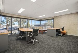 Office fit-out in industrial real estate for sale Airport West with natural light and amenities