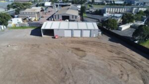 Exterior of commercial warehouse for lease in Laverton North with secure roller door access