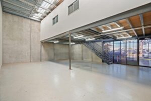 High-clearance warehouse in Airport West industrial property with mezzanine access