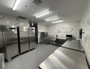 Shop For Lease with Full Fit out including kitchen. Inside the commercial kitchen area