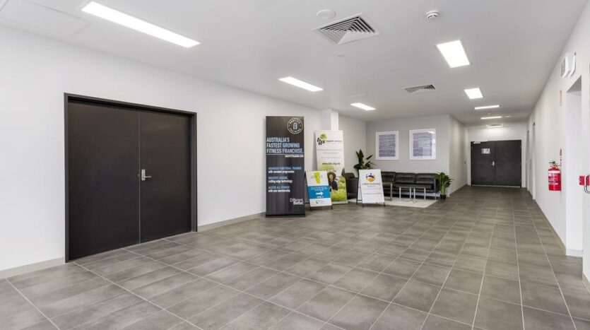 Flexible medical or allied health tenancy with tables and display boards in Craigieburn Junction at Craigieburn Specialist Centre