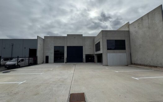Front exterior of standalone warehouse for lease in Tullamarine with secure onsite parking – commercial real estate Tullamarine. 3 Mareno Rd, Tullamarine, VIC, 3043