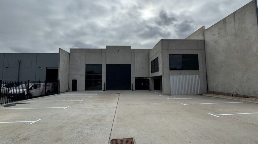 Front exterior of standalone warehouse for lease in Tullamarine with secure onsite parking – commercial real estate Tullamarine. 3 Mareno Rd, Tullamarine, VIC, 3043