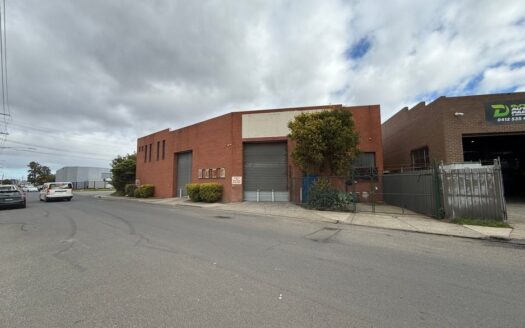Exterior view of warehouse with mezzanine office at 2 Disney Avenue Keilor East VIC